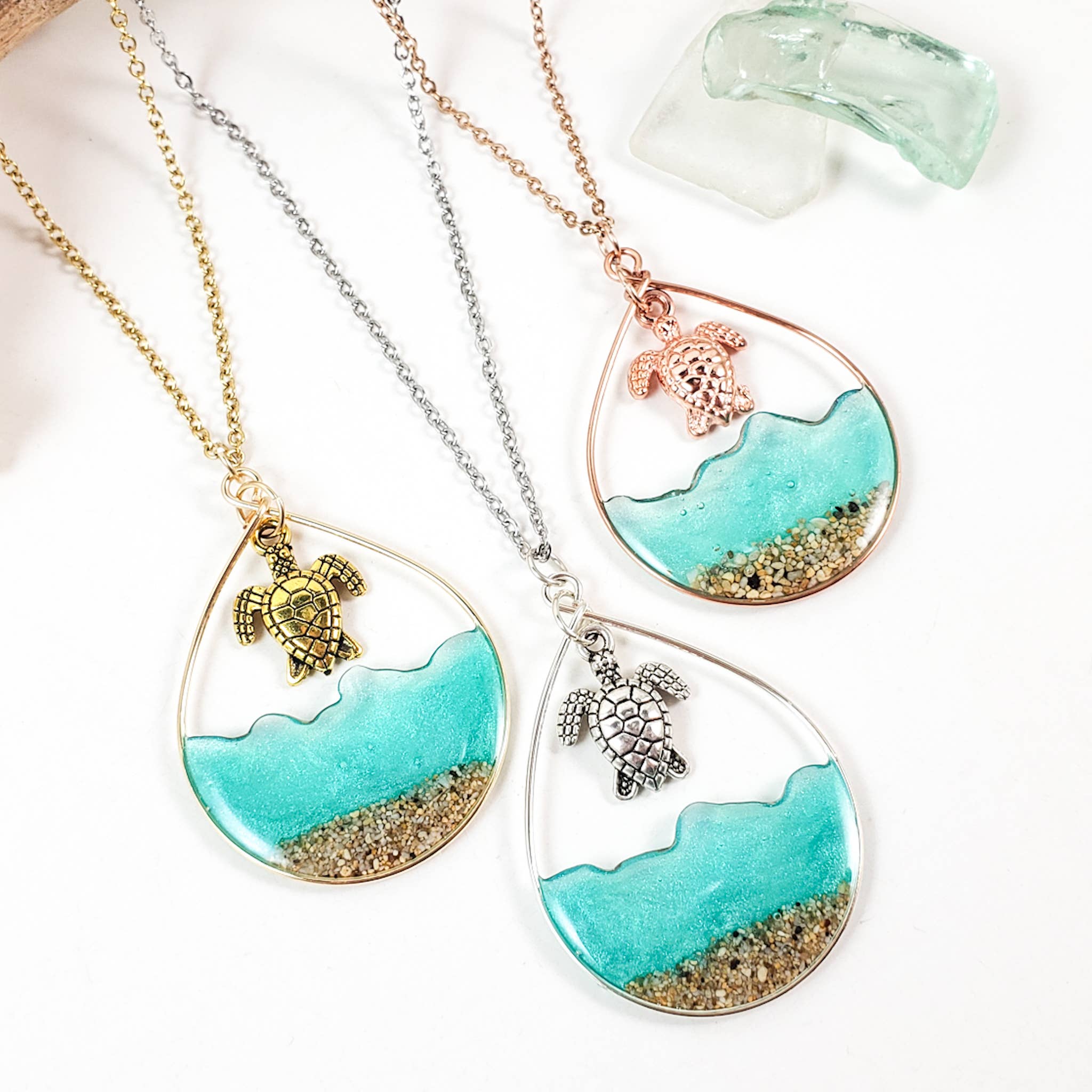 Skinny Pig Designs – wholesale Pendant/charm necklace – Sea green water and sand turtle necklace in yellow gold6