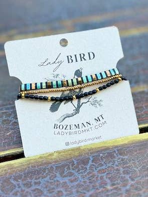 Shiny Black Stripes with Black Tila Bead Bracelet Set | Handmade Stretchy Boho Wrap in Gold or Silver for wholesale by Lady Bird Market