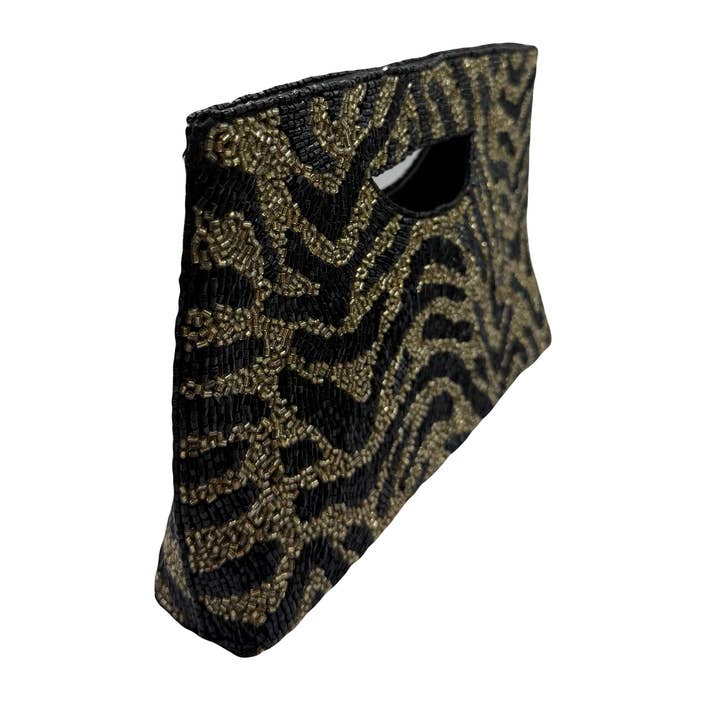 Pizzazz, Inc. – wholesale Clutch bag – women's – Animal Print Double Sided Handbag1