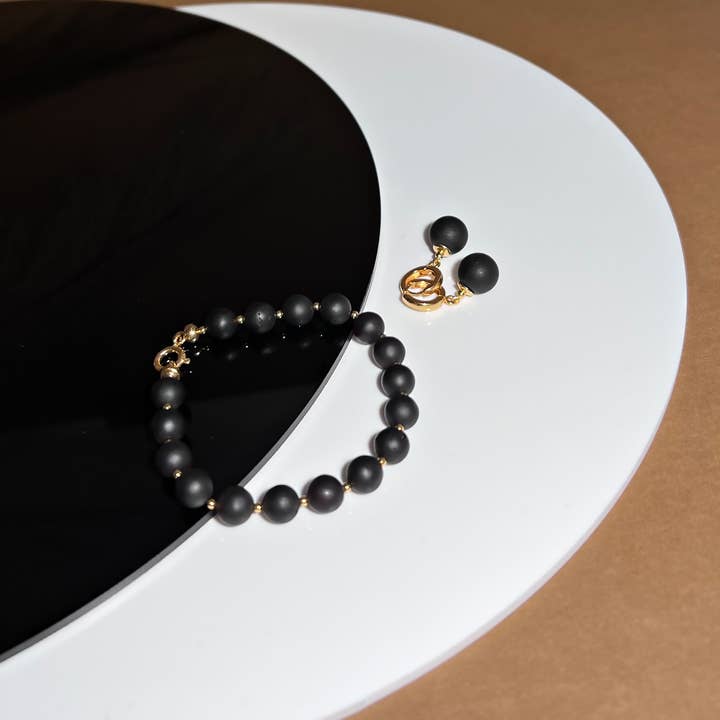 Gintarinė apyrankė reguliuojamo ilgio, auksuotas sidabras 925 „Bellum gold“ für den Großhandel von Amby