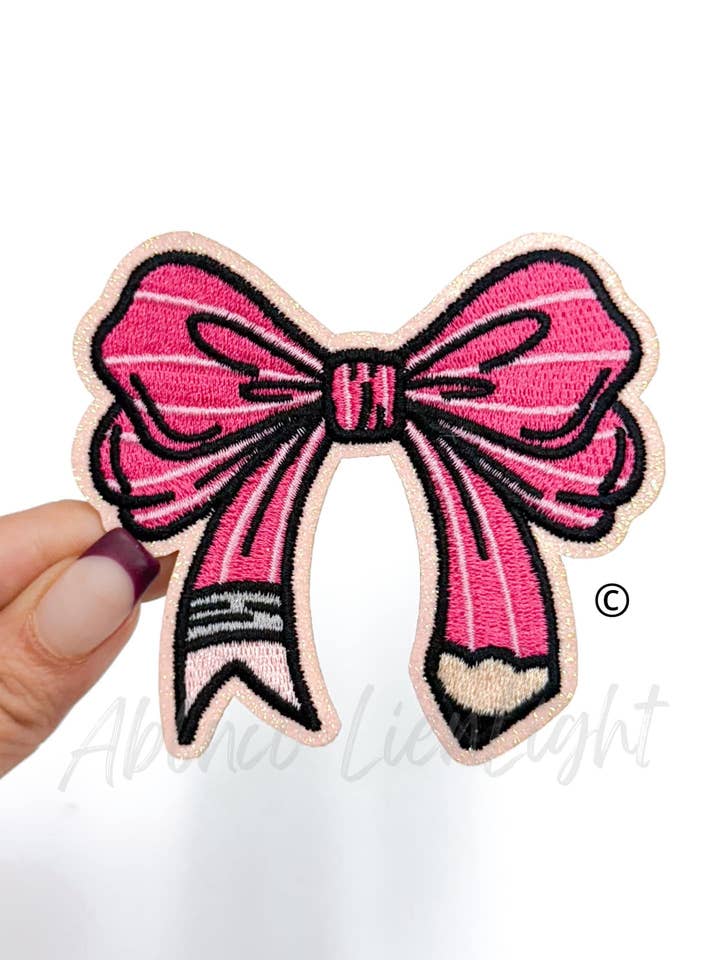 Pink Pencil Bow Embroidery Patch for wholesale by ABLNco