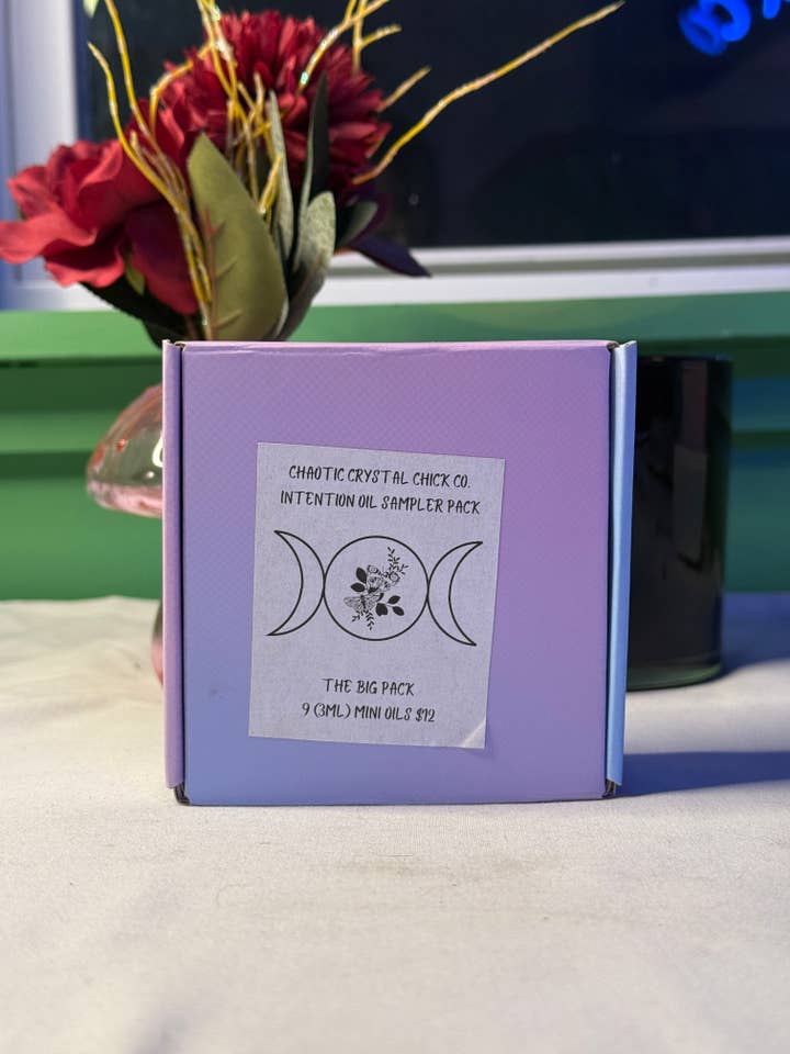 The Big Bundle Crystal Infused Body Oil Sampler Pack for wholesale by Chaotic Crystal Chick Co.