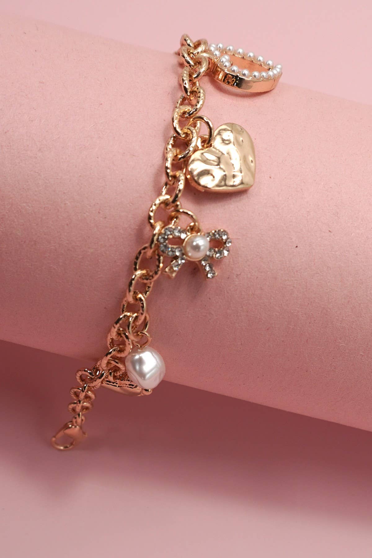 Gold CHARM BRACELET-BOW HEART PEARL DISC CHARMS | 80B1290 for wholesale on Faire1
