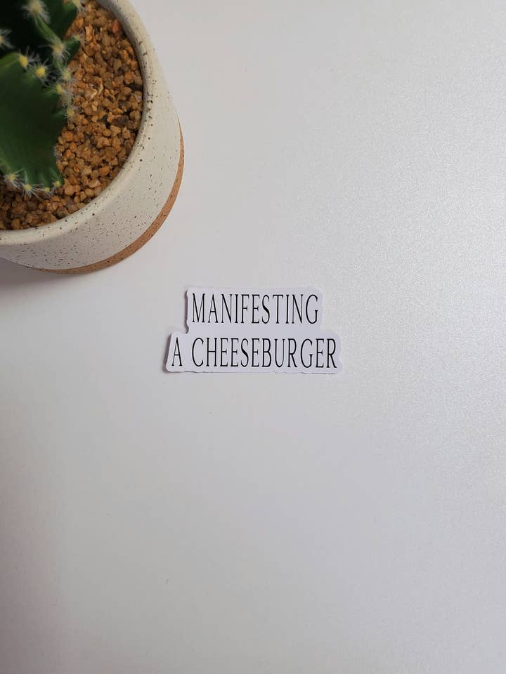 Manifesting a Cheeseburger Text Sticker for wholesale by Fig Tree Works