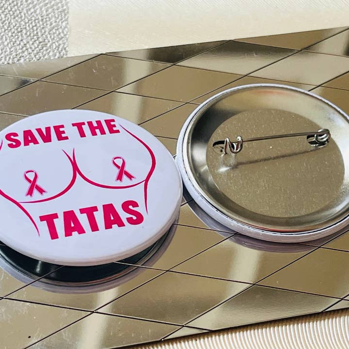 SAVE THE TATA'S - BREAST CANCER AWARENESS 2.25" PINBACK BUTTON for wholesale by Stuck On Joy