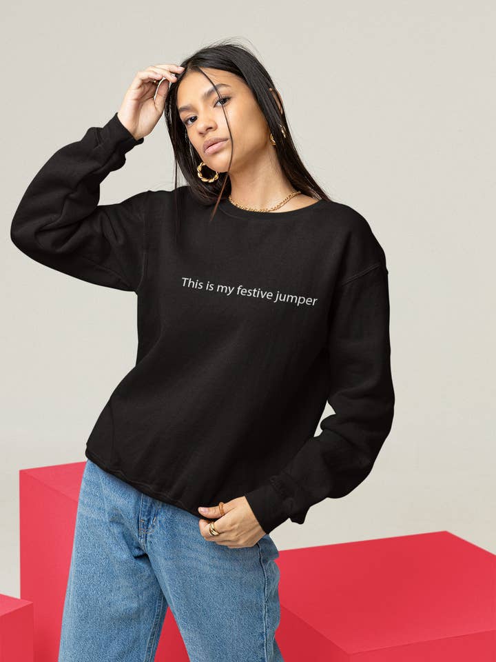 Abbigliamento per adolescenti, maglione dal design discreto e festivo in nero per la vendita all'ingrosso da parte di Adolescent Clothing