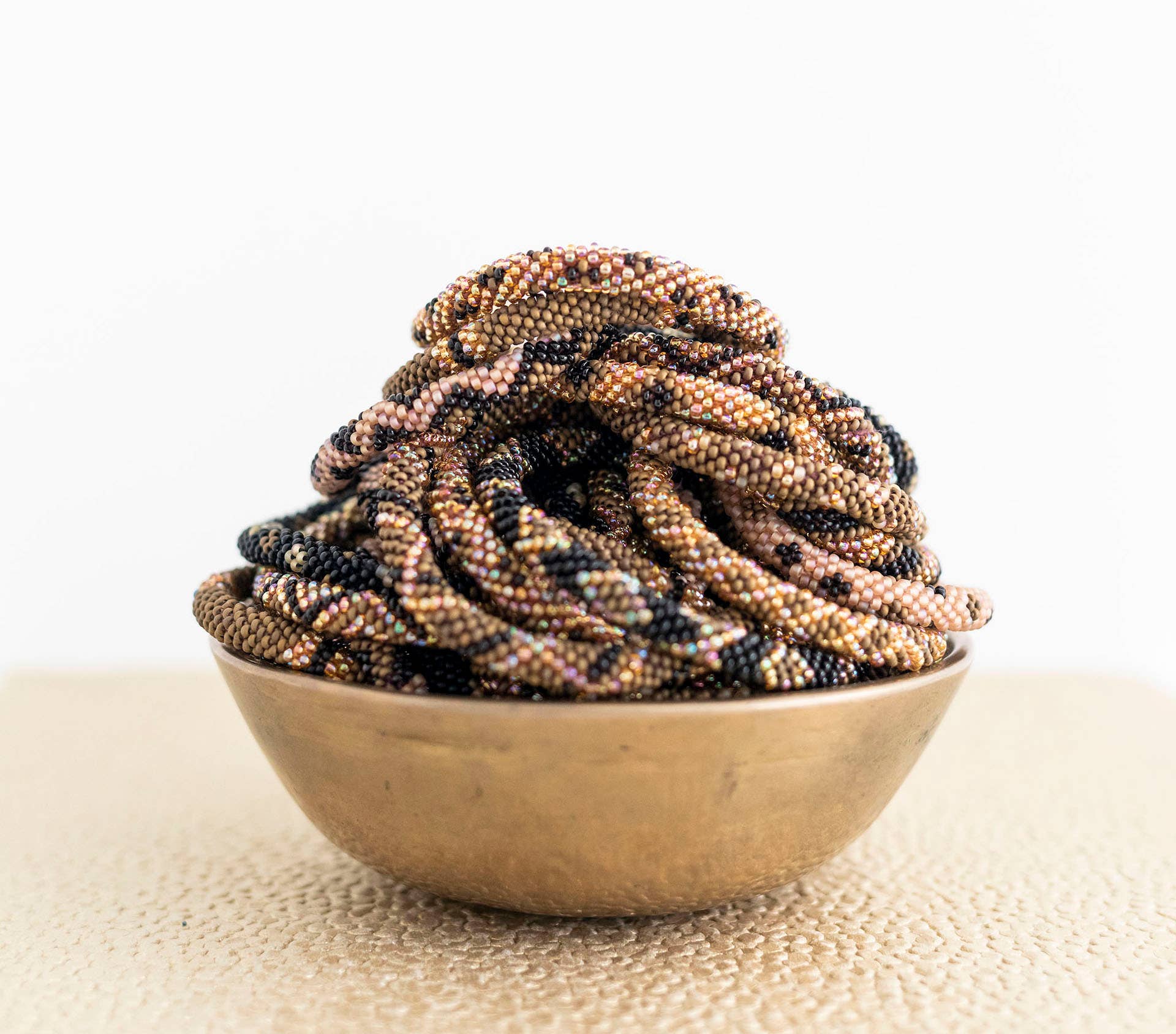 Aid Through Trade - Wholesale Beaded Bracelet - Roll-On® Bracelets - Jaguar Set of 121