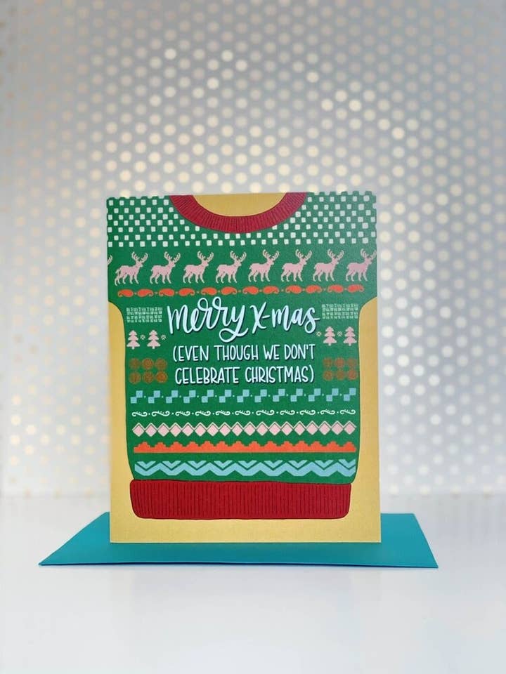 Merry X-mas Even Though We Don't Celebrate It Greeting Card, Christmas 2022 Greeting Card, Holiday Card, Sweater Season Greeting Card for wholesale by chit-chaat