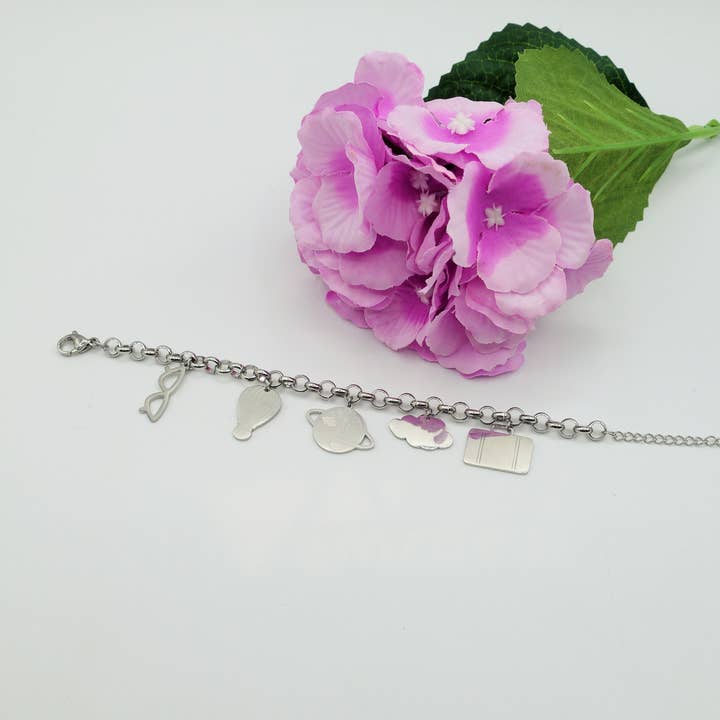 FLY ~ ACCIAIO INOSSIDABILE- Bracciale con ciondoli tema viaggio e passioni for wholesale by Daemon srls