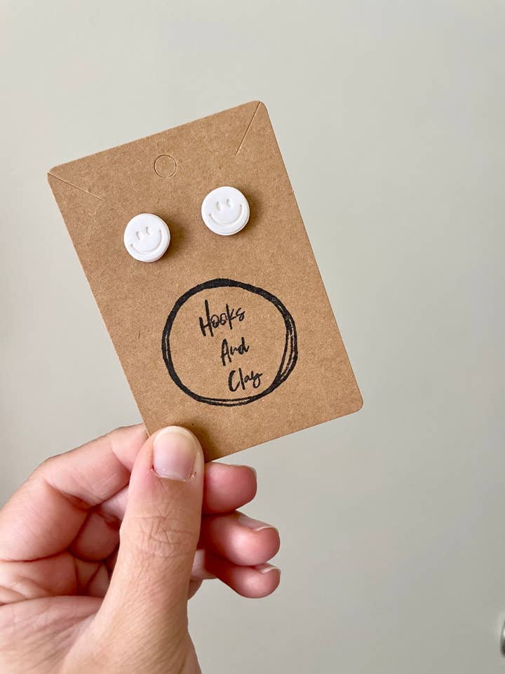 Happy Stud Polymer Clay for wholesale by Hooks and Clay