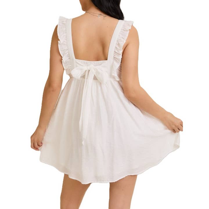 Robe Baby Doll Mini sans manches avec détails à volants et nœud dans le dos avec pour la vente par Blue Bunny Inc