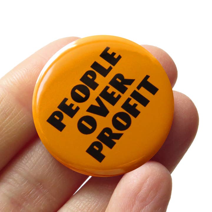 PEOPLE OVER PROFIT Pin 1.25" Social Justice Button for wholesale by Word For Word Factory