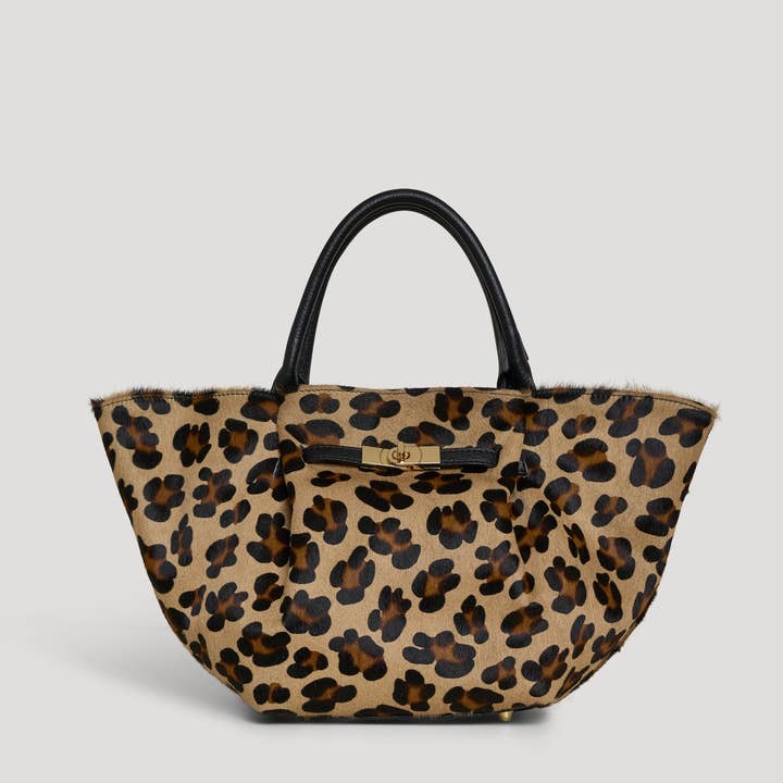 Charlène Limited Edition Bag in Calf Hair and Leopard Leather and other Purchase Wholesale charniere. Free Returns & Net 60 Terms on Faire trending on Faire.