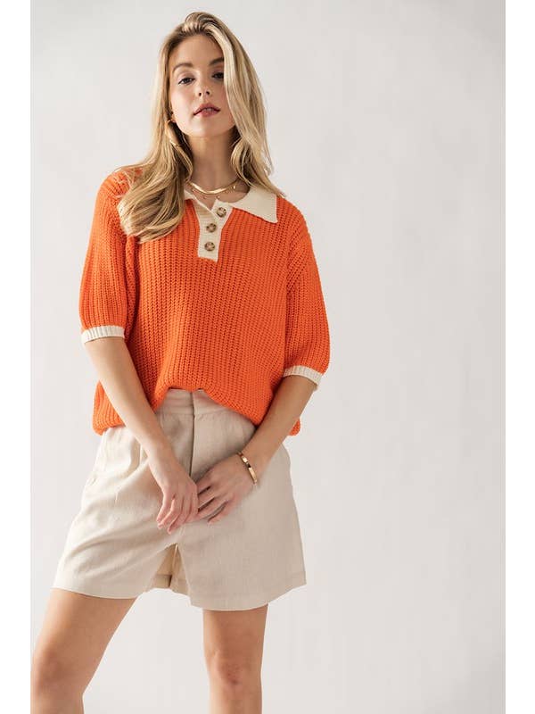 Orange TWO-TONE CONTRAST QUARTER BUTTON KNIT SWEATER for wholesale on Faire