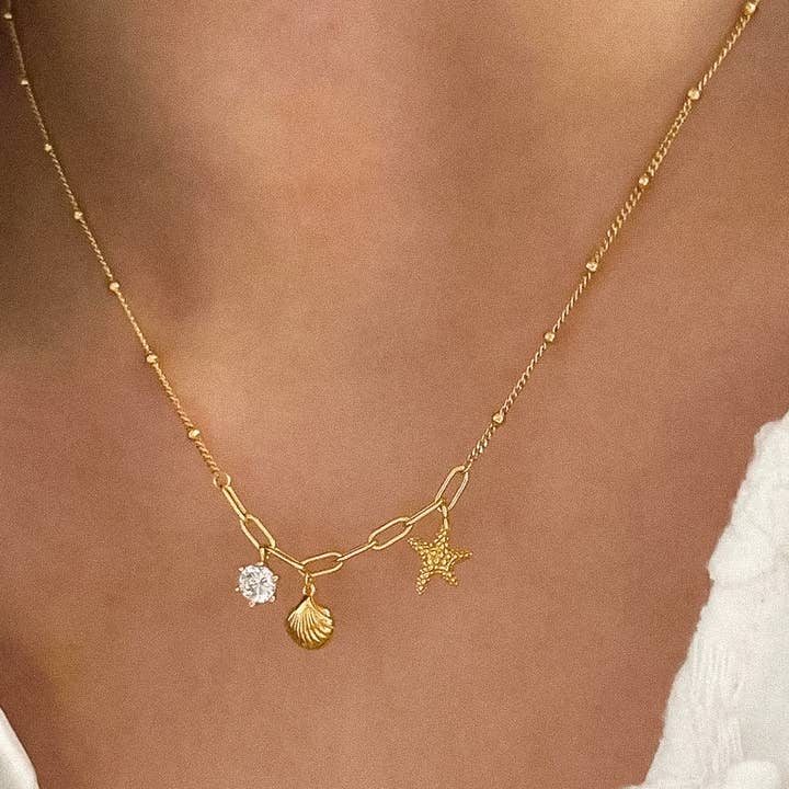 Roshell 18K Gold Non-Tarnish Shell and Start Necklace for wholesale on Faire