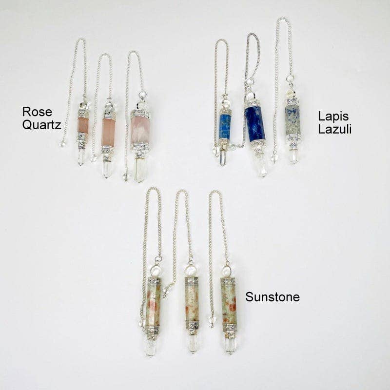Rock Paradise – wholesale Meditation supplies – Crystal Quartz Point Pendulum with Silver toned Chain1