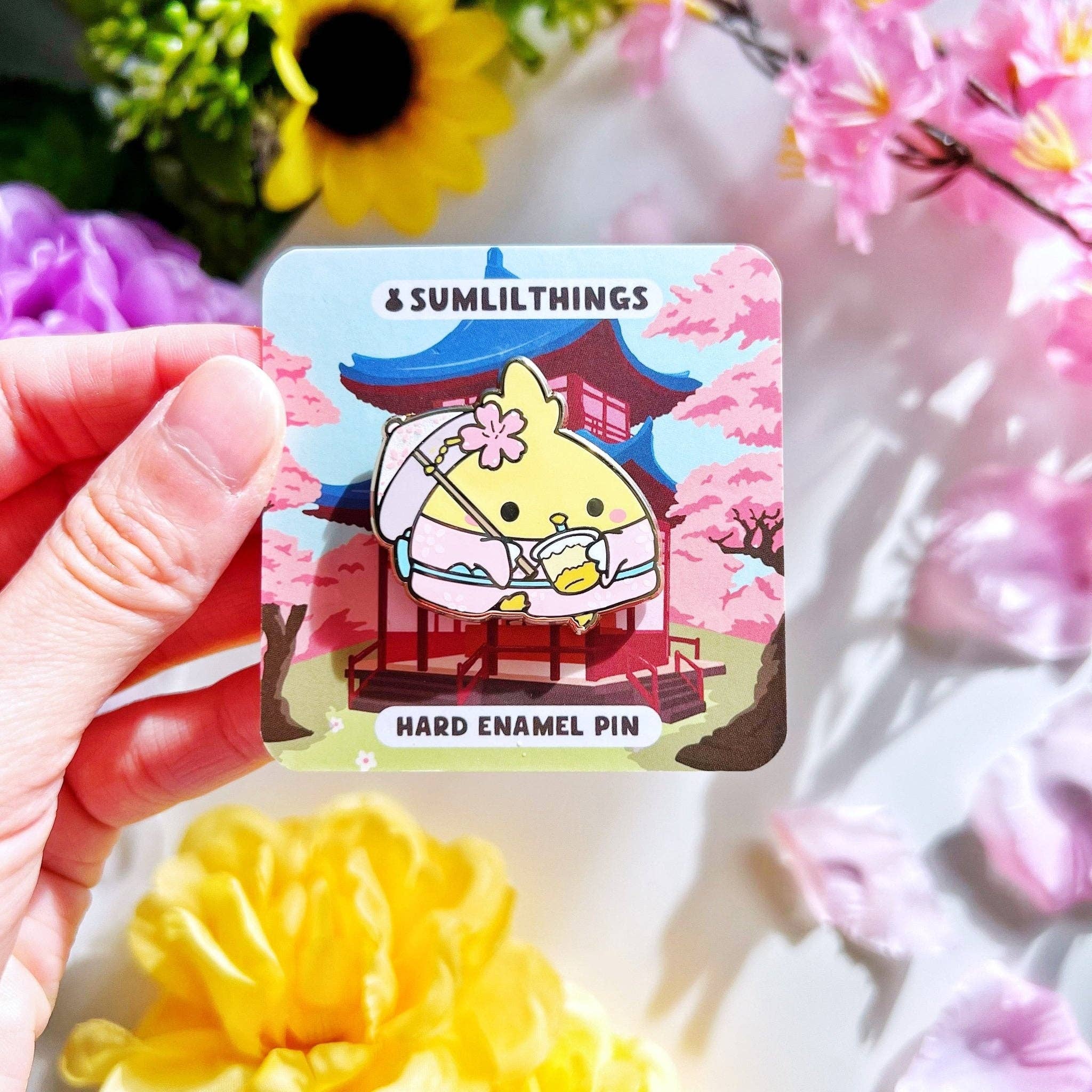 SumLilThings – wholesale Lapel pin/button – Enamel Pin - Chichi the Cockatiel with Mango Pomelo Drink0