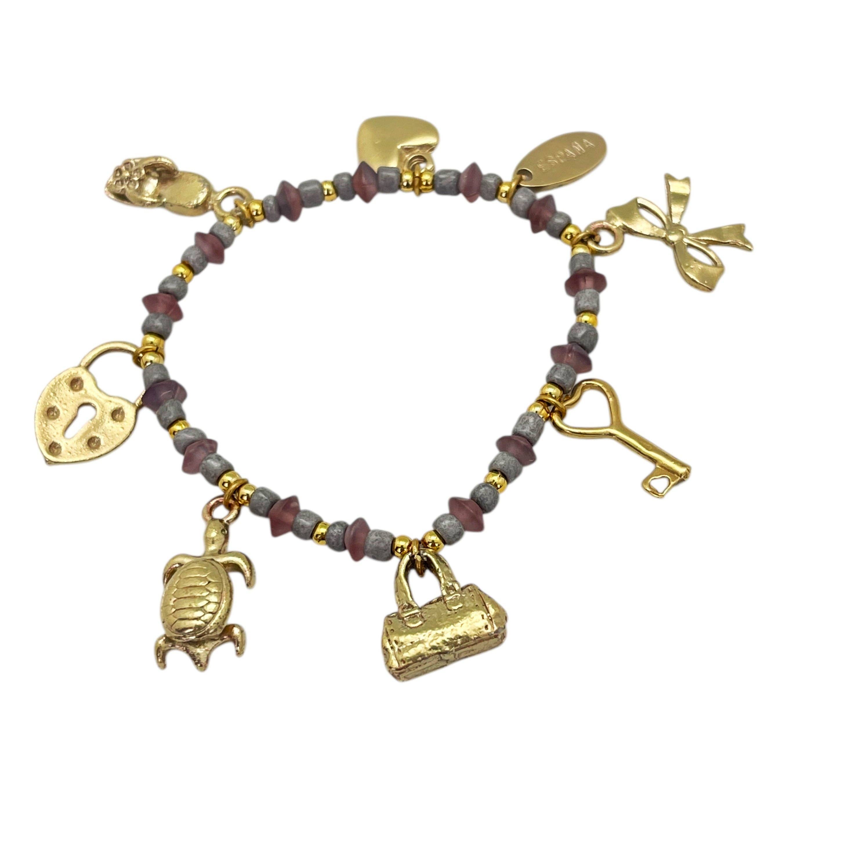 Gloria Mago - Wholesale Charm/Dangle Bracelet - Elastic bracelet with gold charms and pink-tone resin beads0