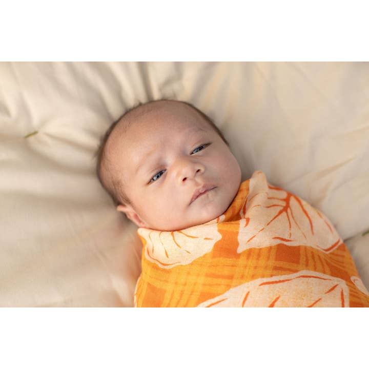 The Keiki Dept - Wholesale Swaddle - Baby - Caramel Orange Palaka Kalo Bamboo Muslin Kapa Moe (Swaddle Blanket)