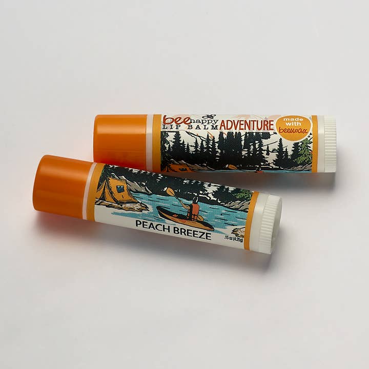 Lip Balm Mountain Camp (peach) with jojoba, aloe, vitamin E and other Purchase Wholesale mountain adventure. Free Returns & Net 60 Terms on Faire trending on Faire.