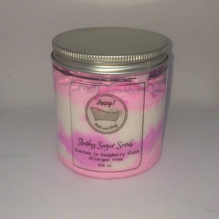 A whipped sugar scrub scented in Raspberry Slush for wholesale by Zappy Bath and Body