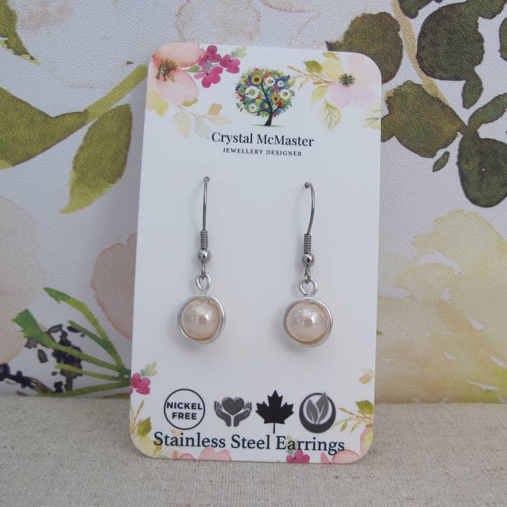 Brincos de aço inoxidável com creme de pérola por atacado de Crystal McMaster Jewellery Designer