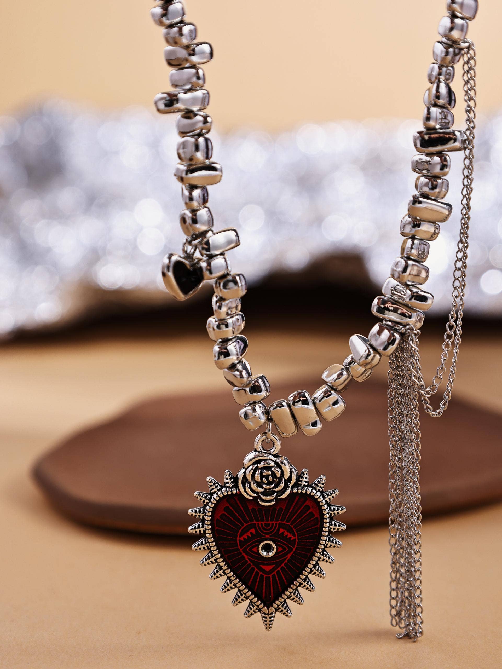 Revelari – wholesale Pendant/charm necklace – Silver Beaded Necklace with Heart Pendant and Tassel0