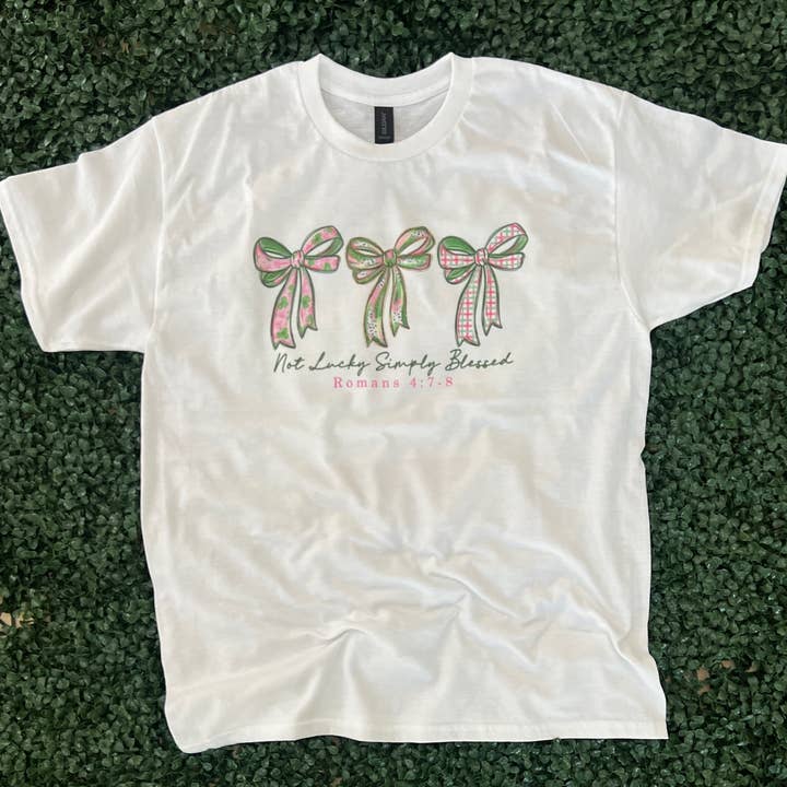 Not Lucky Simply Blessed Bow Trio on White Tee for wholesale by RMN Wholesale