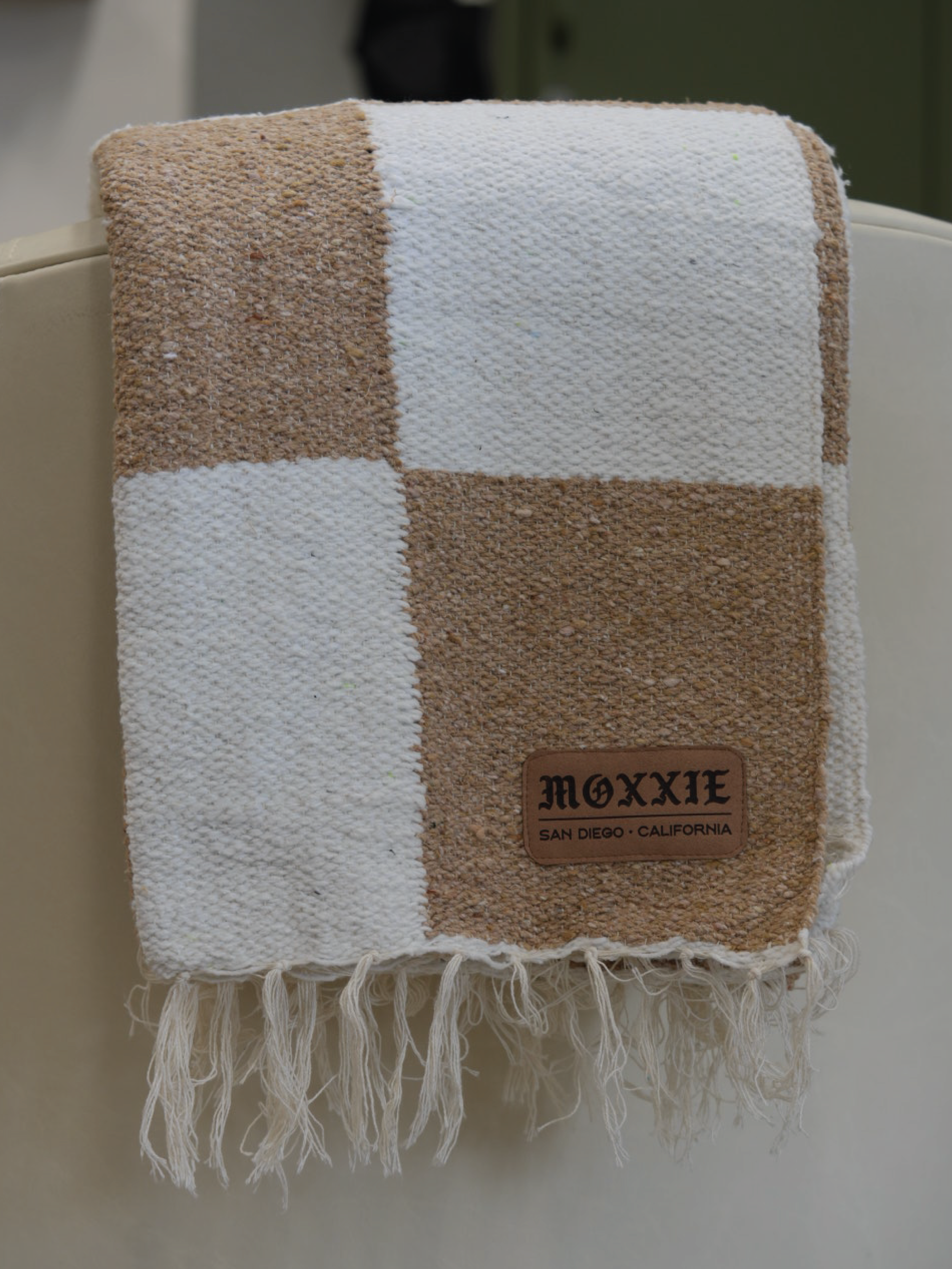 Natural Checkered Baja Blanket for wholesale on Faire2