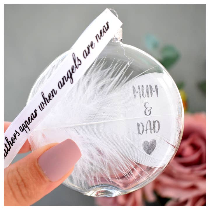 MUM & DAD Memory Bauble Glass Round. Real White Feather for wholesale by Amaya Rose Ltd.
