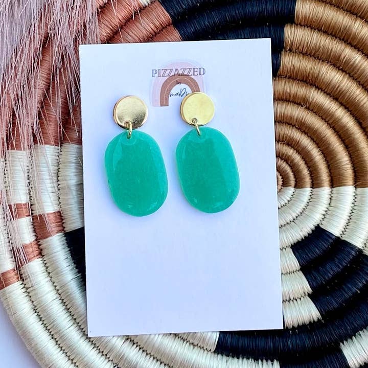Emerald green oval dangles for wholesale by Pizzazzed by Mads