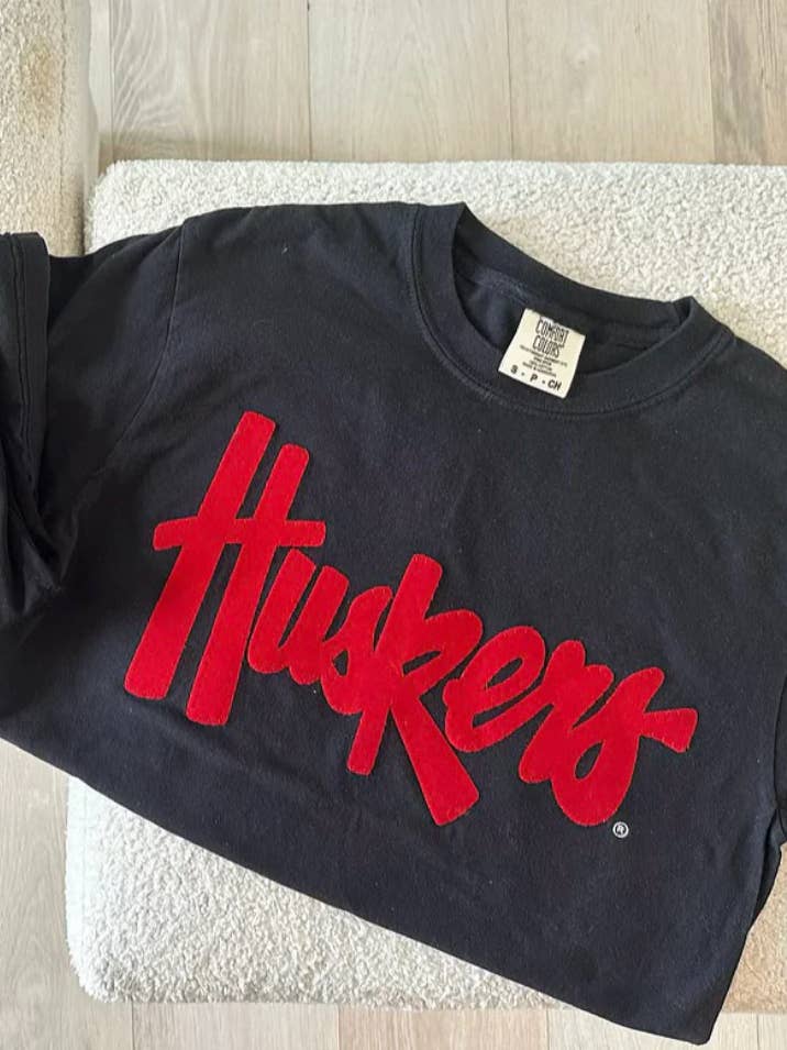 HUSKERS - BLACK COMFORT COLORS TEE for wholesale by h.flynn
