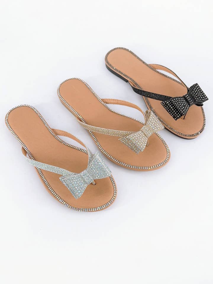 CHAMPAGNE FANNIE JEWELED BLING BOW THONG SLIDE for wholesale on Faire