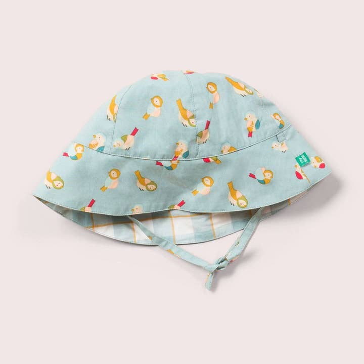 Chapeau de soleil réversible Rainbow Birds pour la vente par Little Green Radicals EU