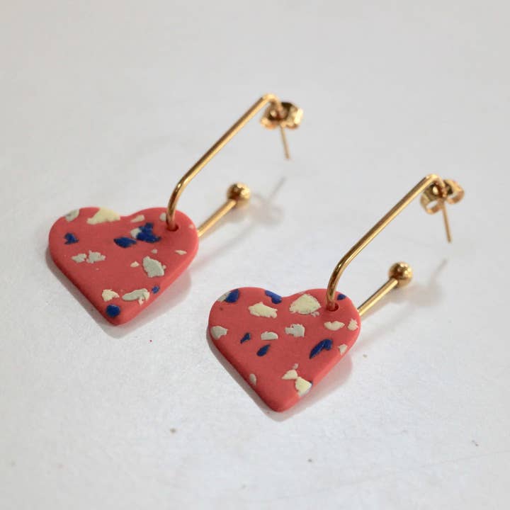 The Aure heart salmon terrazzo ivory and electric blue for wholesale by Club Paillettes