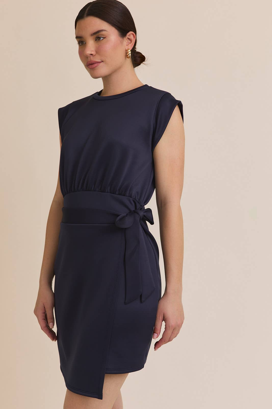 NAVY ROUND NECK SLEEVELESS WRAP MINI DRESS for wholesale on Faire1