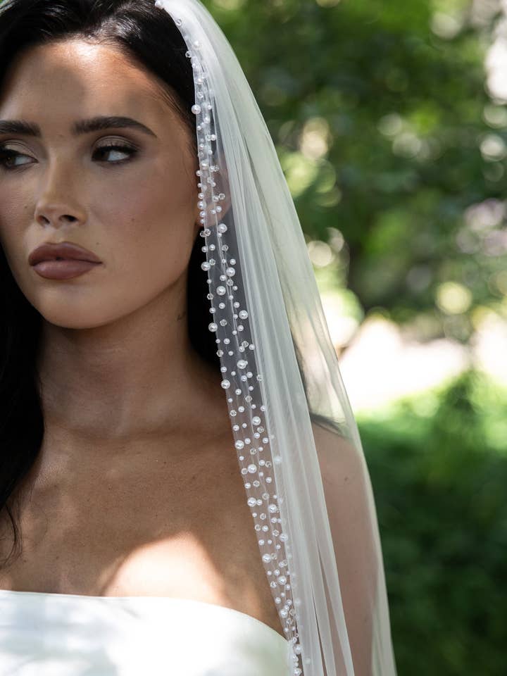 VS25-018 for wholesale by Heirloom Bridal Company