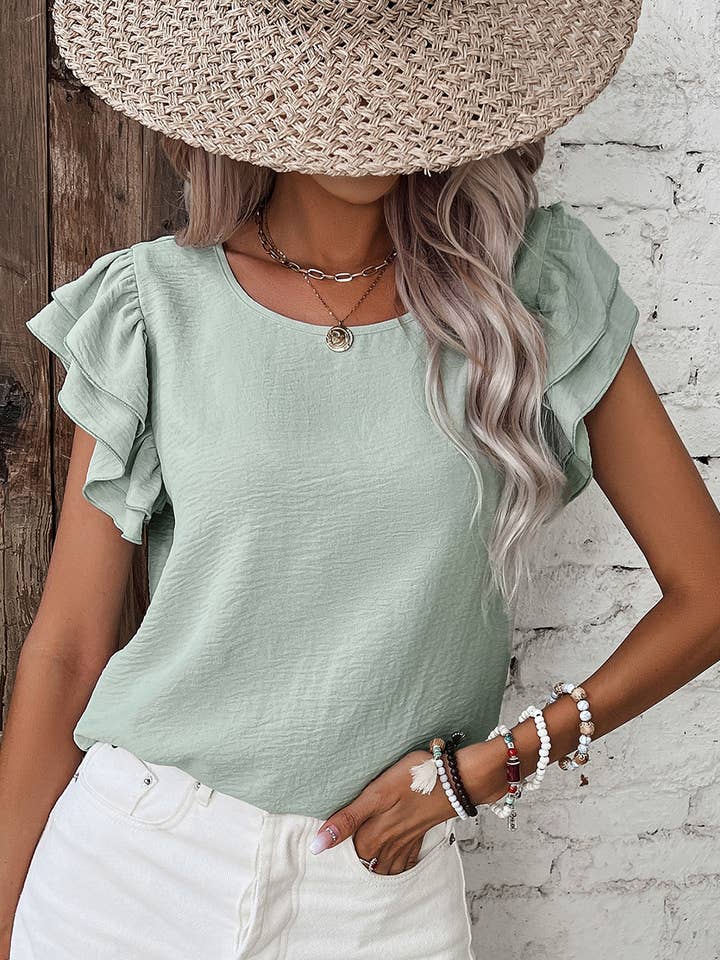 Blouse décontractée à manches courtes à volants de couleur unie pour la vente par PartyEight