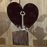 Flying Heart Threads - Wholesale Decorative Tabletop Object - Assorted Small Rusty Metal Spring Holiday Pieces on a Limb4