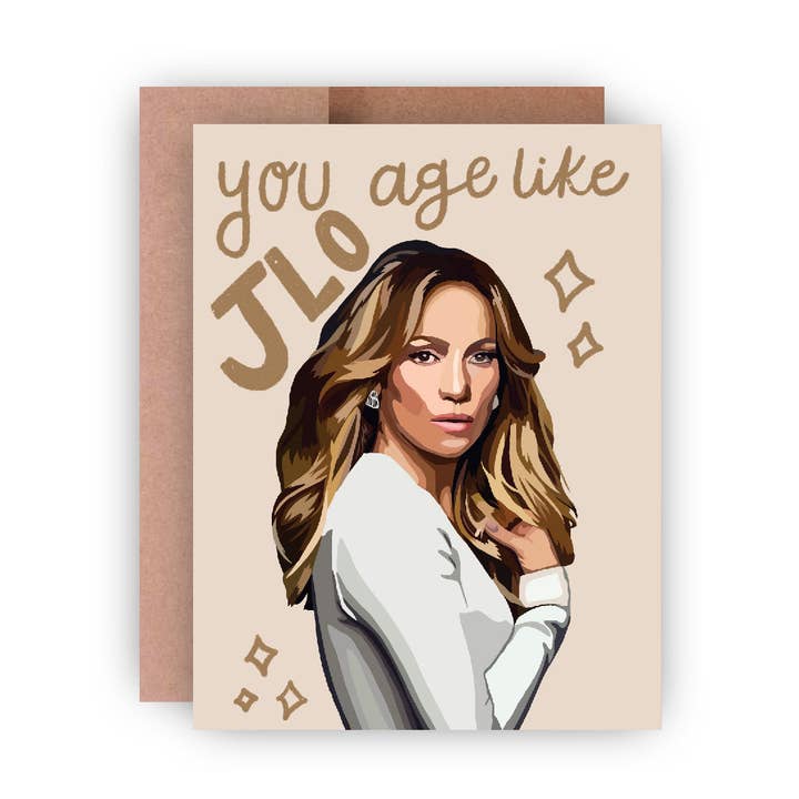 Tarjeta de felicitación de cumpleaños A2 con texto «You Age Like J Lo» para venta al por mayor de Paper Rings Press