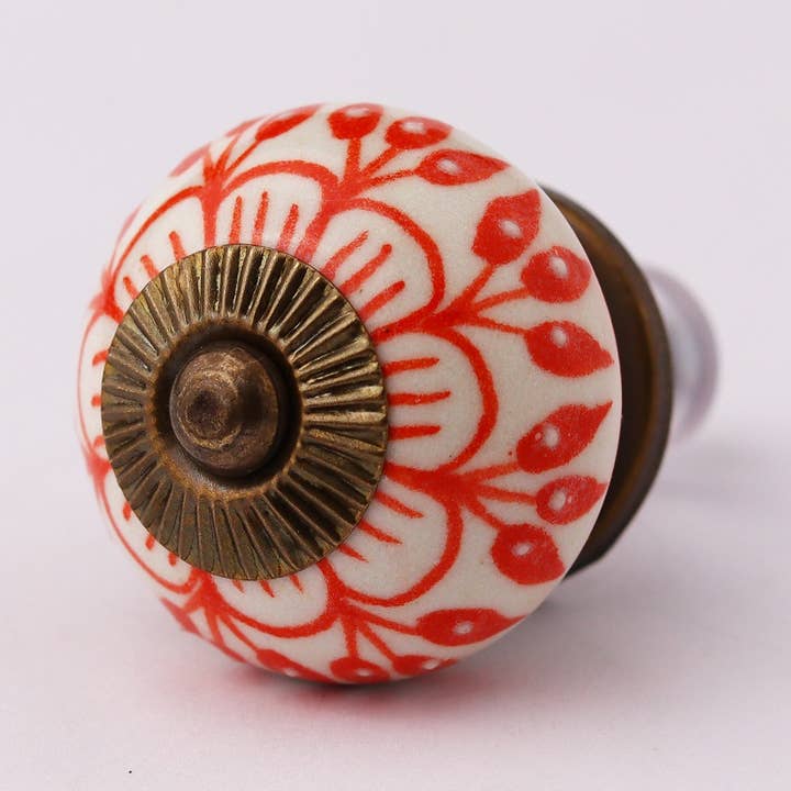 Orange köksskåpsknoppar keramik Zinnia unikt handtag för wholesale av Daana Paani LLC