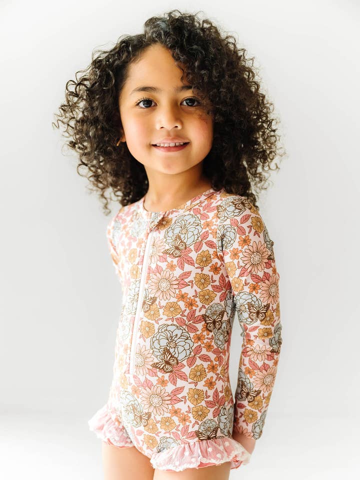 Maillot de bain une pièce Harper à volants et protection UV à fleurs pour la vente par Khloe jean clothing