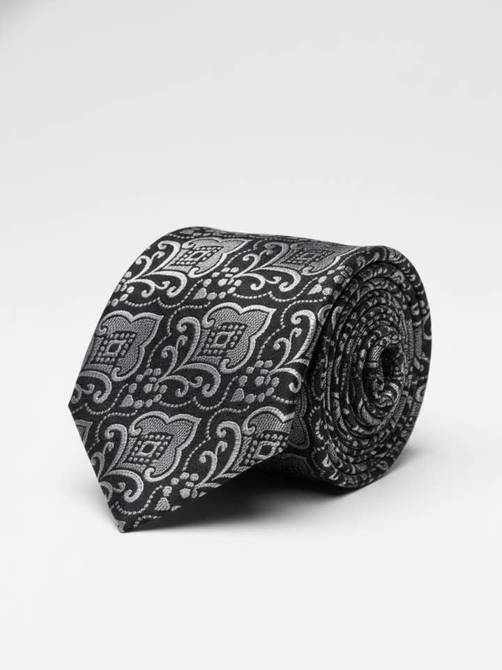 Black Tie with White Work Pattern – Classic Formal Necktie
for wholesale by Masculine Moda