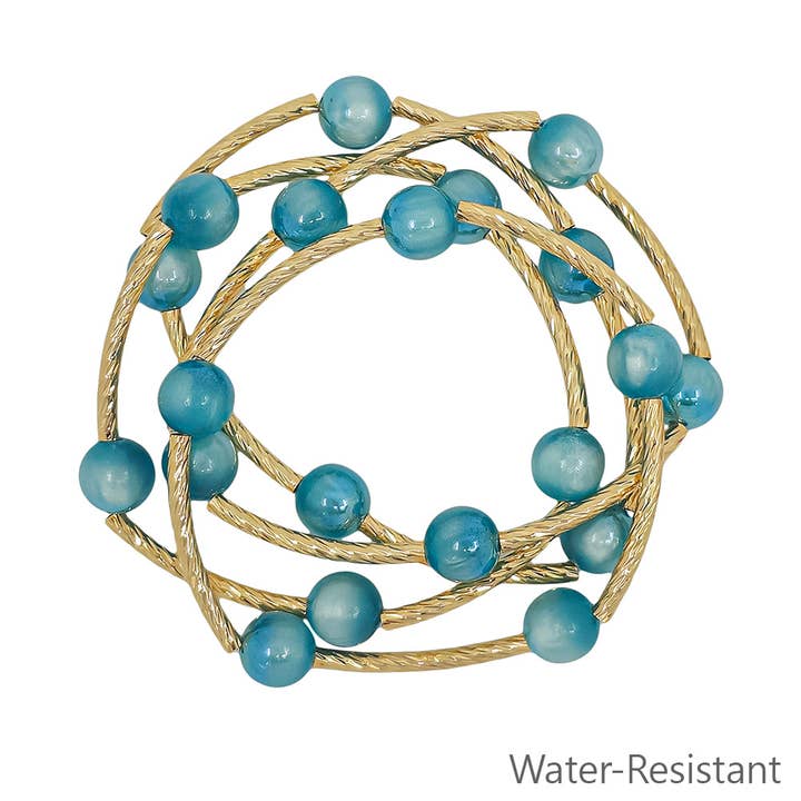Set of 3 Turquoise "Candy" Beaded with Gold Piping Stretch Bracelets for wholesale by What's Hot