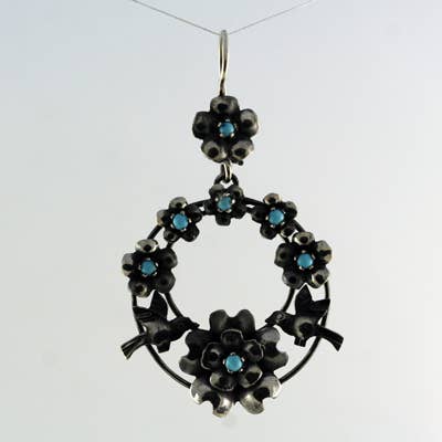 Sterling/Turquoise Round Earrings with Doves for wholesale by Moosepablos, Inc.