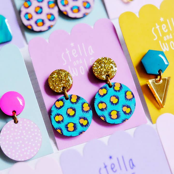 Turquoise and orange leopard print glitter drop earrings  for wholesale by Stella and Wolf