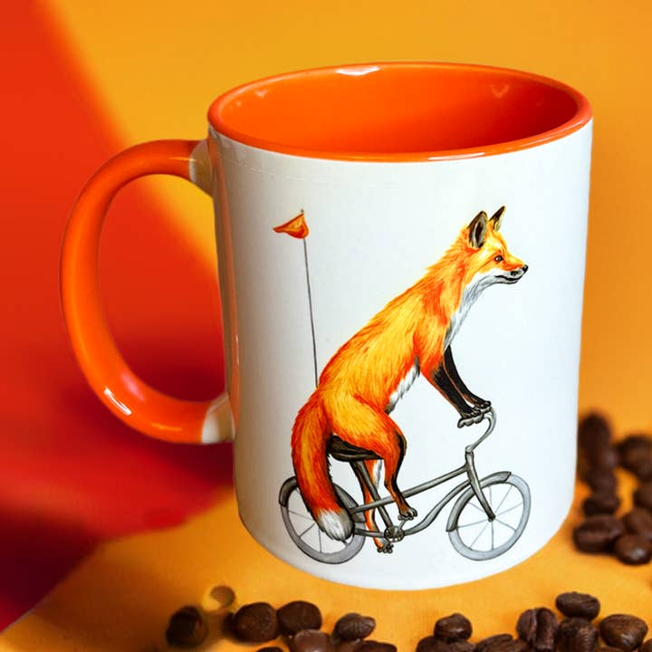 Fox riding a Bike Mug for wholesale by Sardines Studio