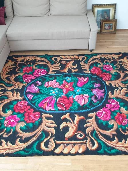Gorgeous floral Moldavian rug handwoven in Romania, black for wholesale by MADE WITH LOVE RO SRL