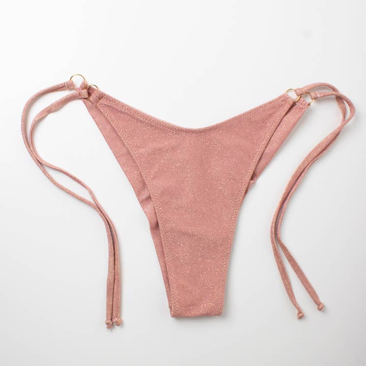 Glitter Braziliaanse slip met bandjes in poederroze voor wholesale door Helis Brain