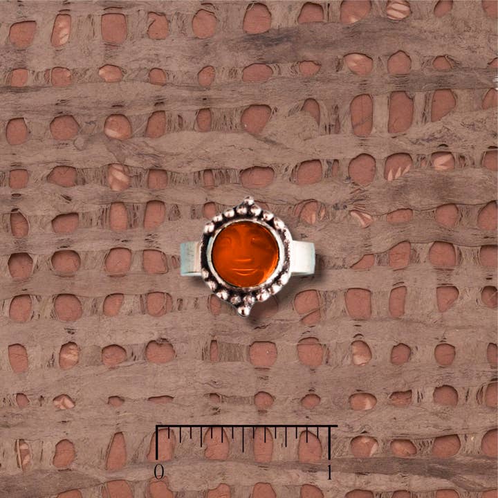 Round Amber Carved Face Ring for wholesale by Tidepool